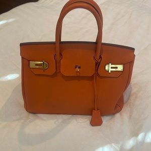 Hermès orange Birkin bag, size 30
